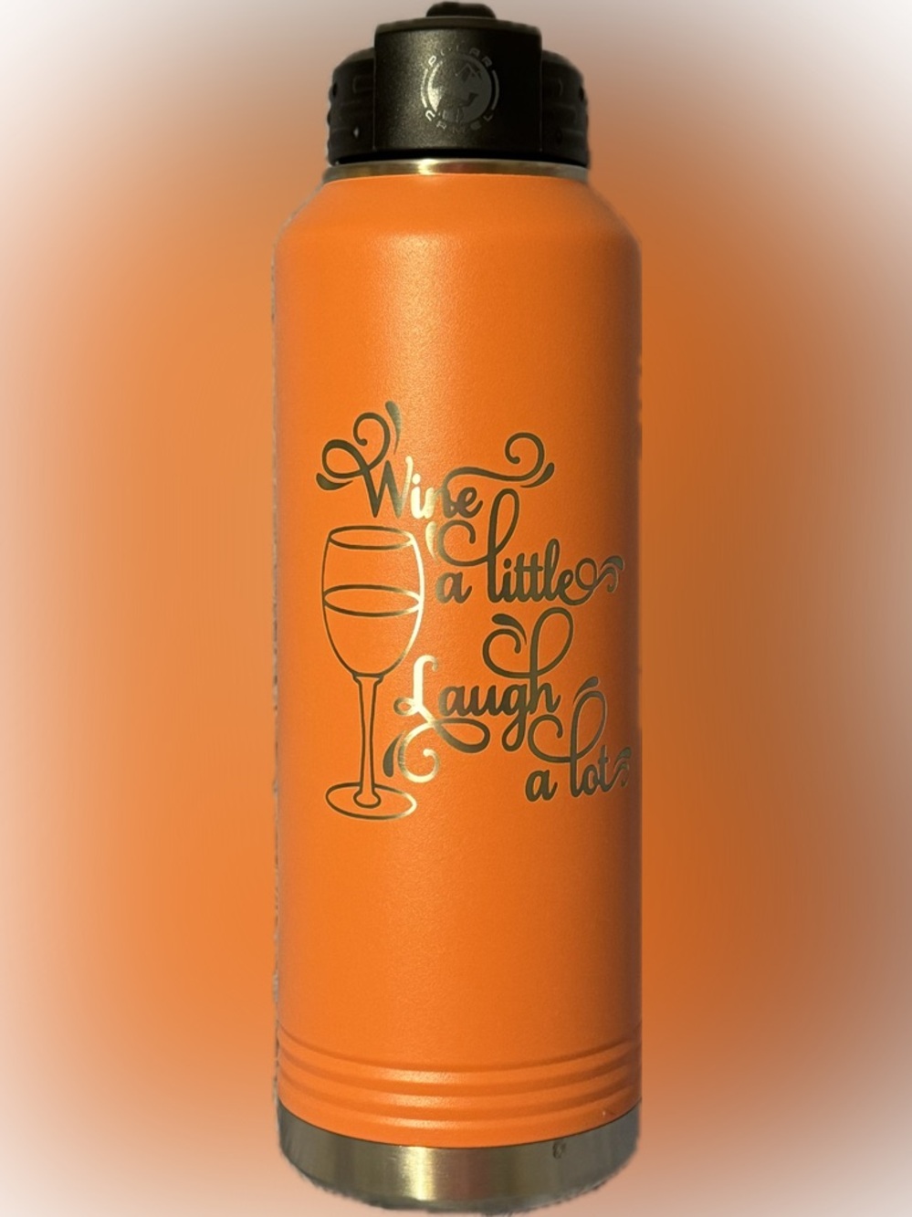 Orange Water Bottle With Laser Engraved Script Saying